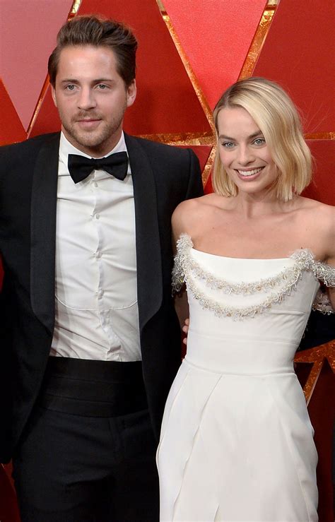 margot robbie in bikini|Margot Robbie kisses husband Tom Ackerley while。